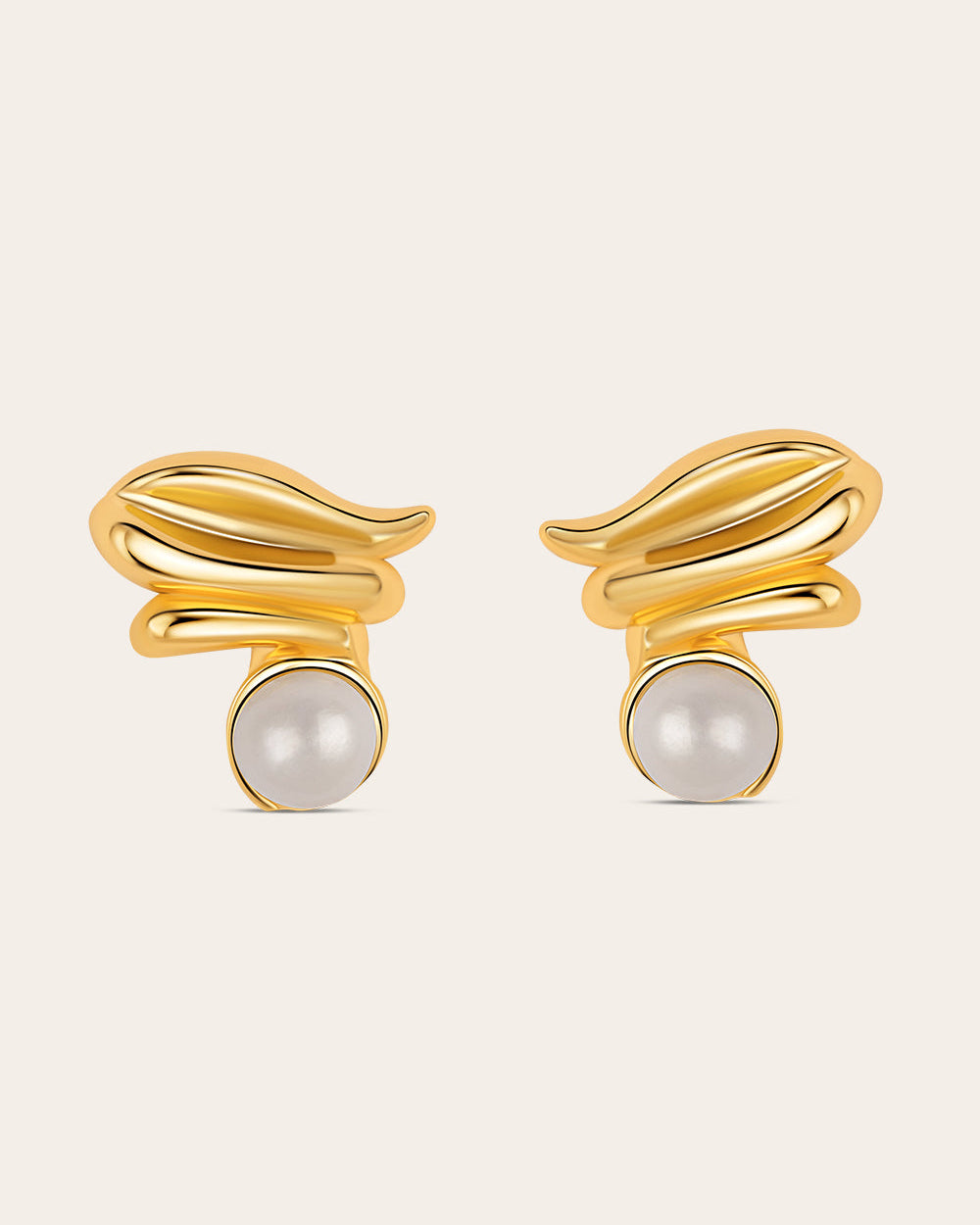 Gold plated sculptural earrings with white pearls