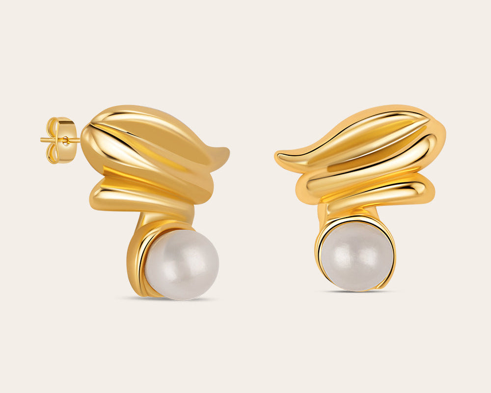 Front and side view of gold plated pearl earrings