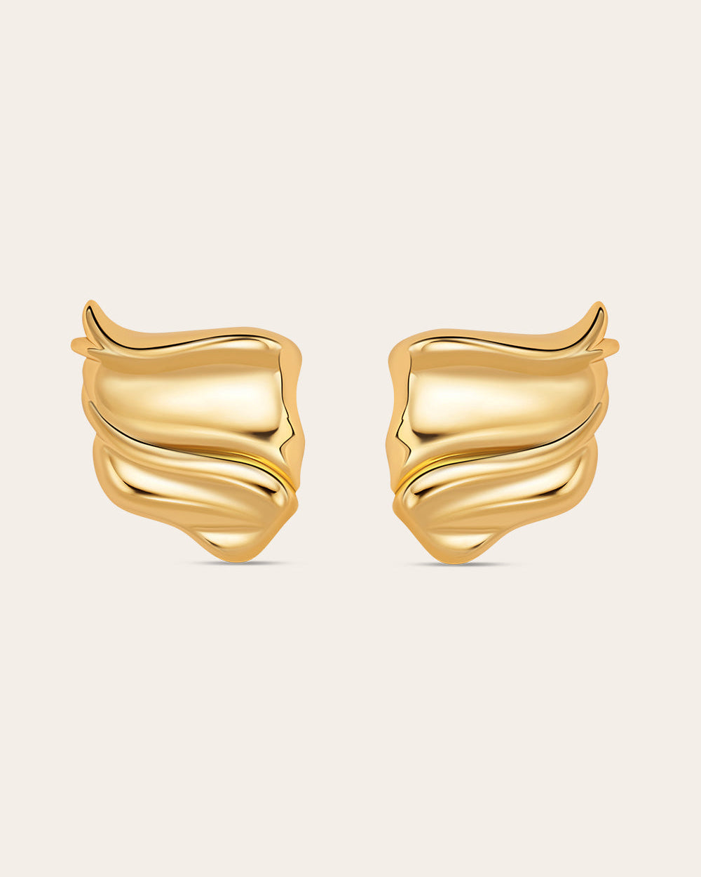 Gold plated sculptural statement earrings