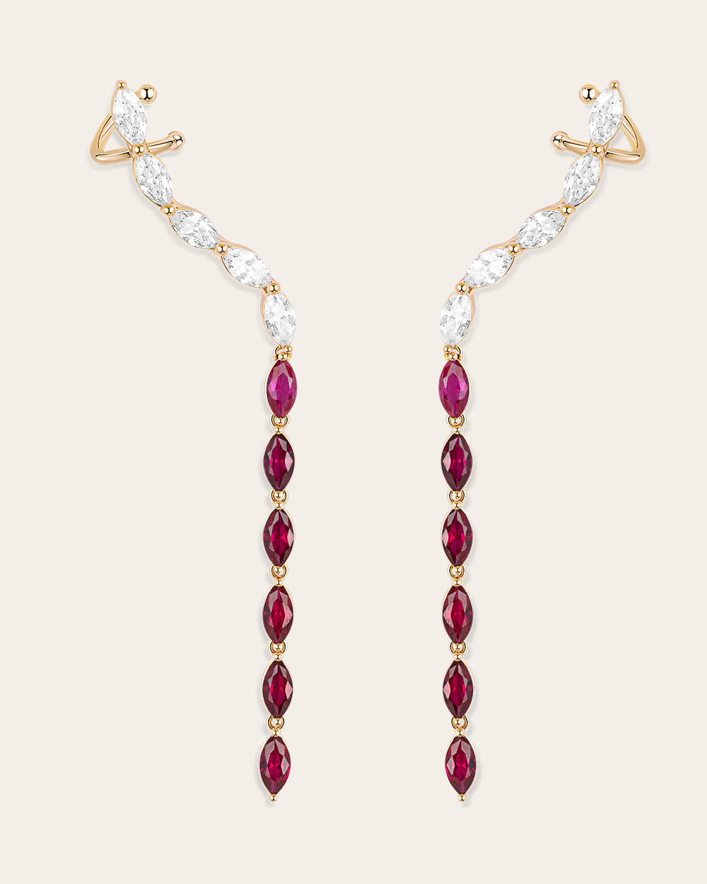 Packshot of a gold plated long hanging earrings with burgundy zirconia stones 