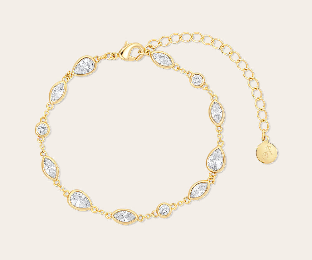 Gold bracelet with teardrop and crystal details