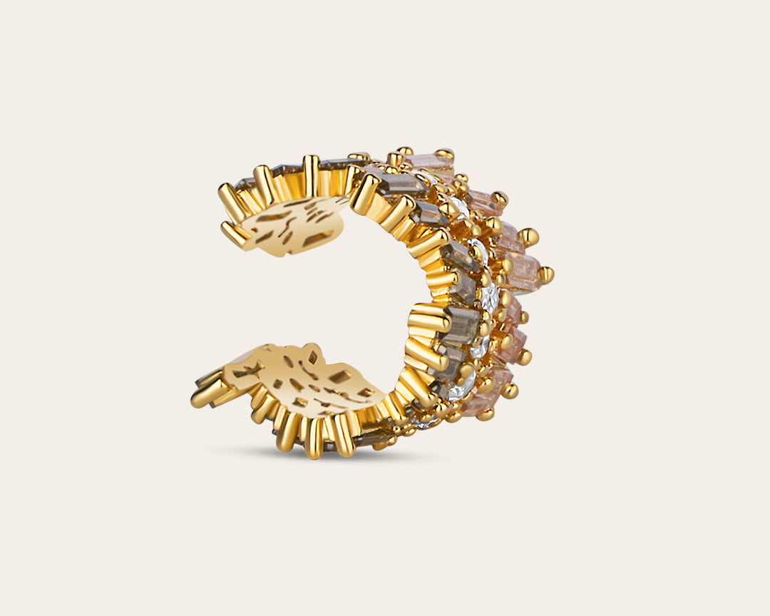 A product photo of the big ear cuff standing on its side on a light background. 