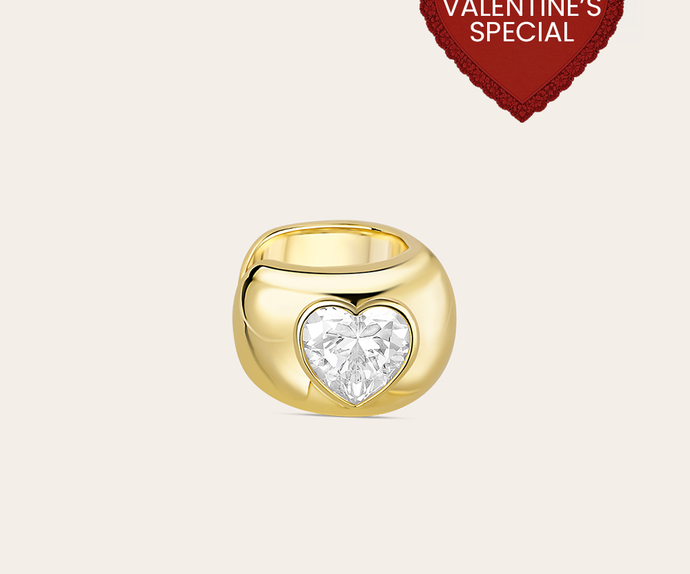 A light background product photo of the gold ear cuff with heart. A red heart in the right corner "Valentine's special".